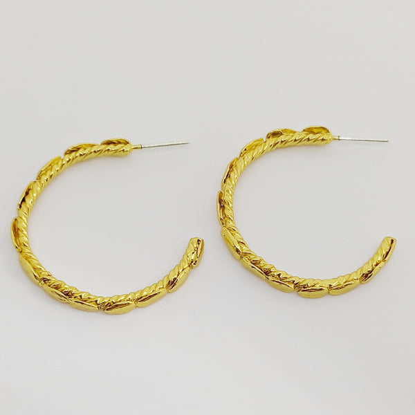 Candongas Pétalos en plata con baño de oro